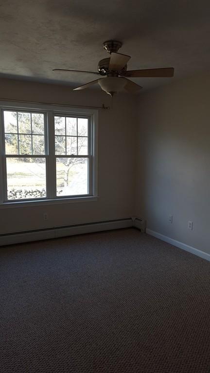 236 Hardwick Road New Braintree, MA 01531 - Photo 15 of 28 a view of an empty room and a window