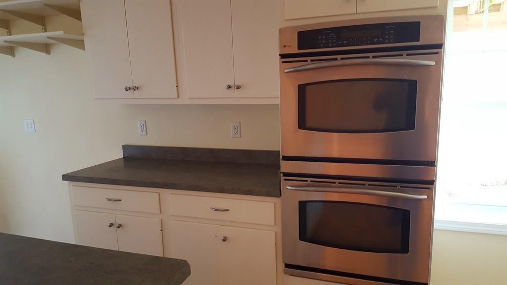 236 Hardwick Road New Braintree, MA 01531 - Photo 21 of 28 a kitchen with appliances and cabinets