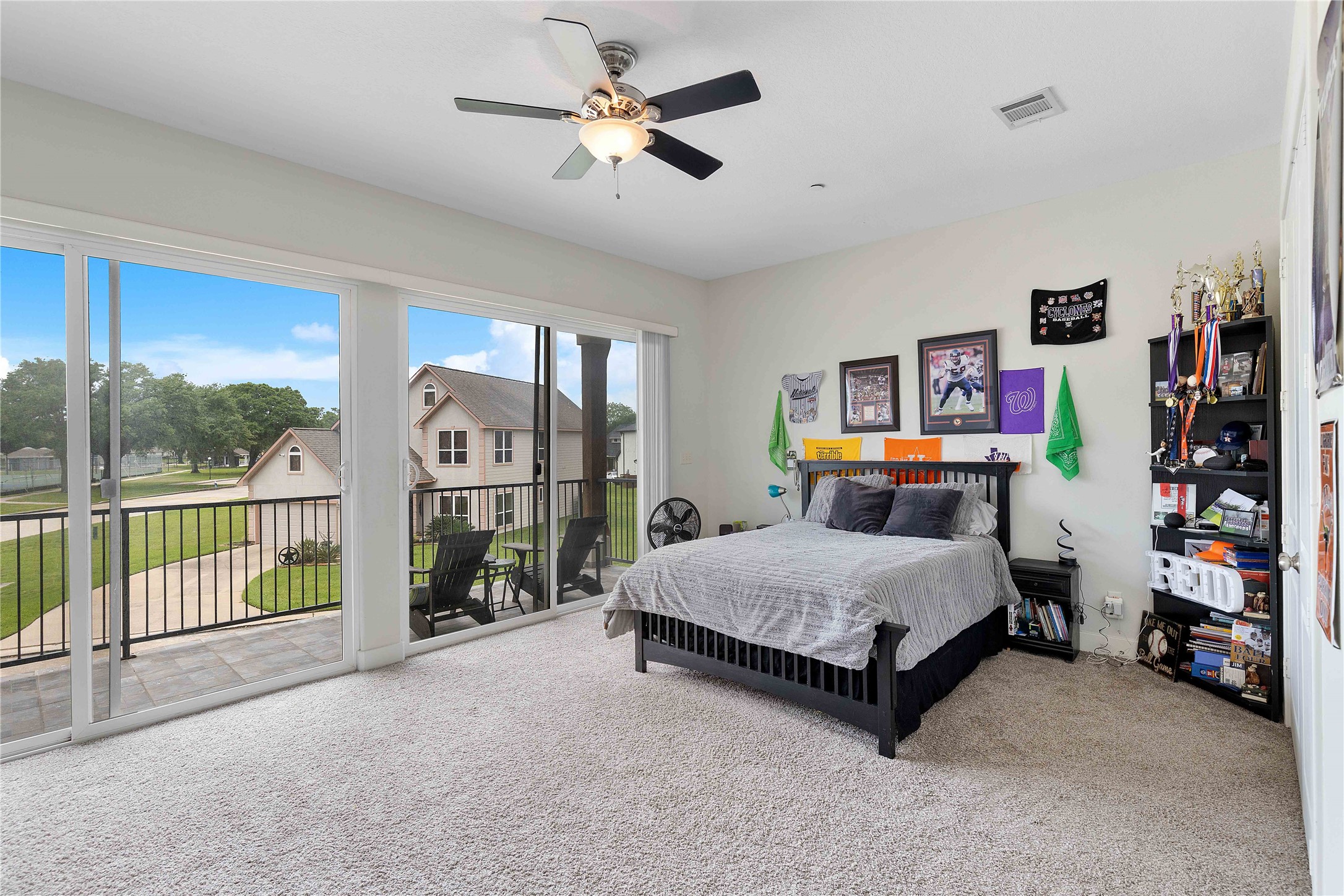 11434 Ketch Court Willis, TX 77318 - Photo 26 of 50 a spacious bedroom with a bed closet and a large window