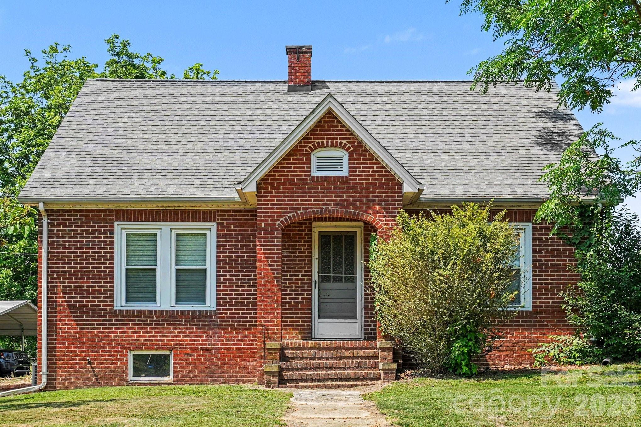 24359 Ridgecrest Road Locust, NC 28097 - Photo 22 of 26 front view of a house with a yard