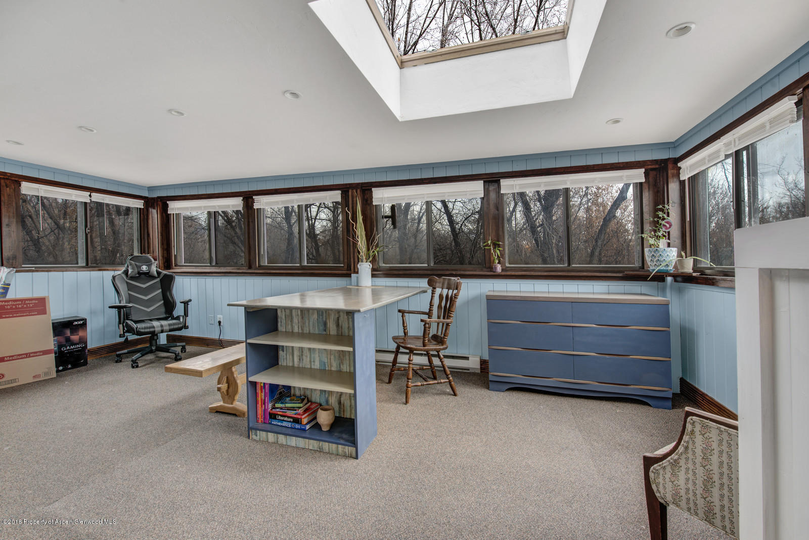 520 Ash Avenue Rifle, CO 81650 - Photo 8 of 21 a view of a room with furniture window and a ceiling fan