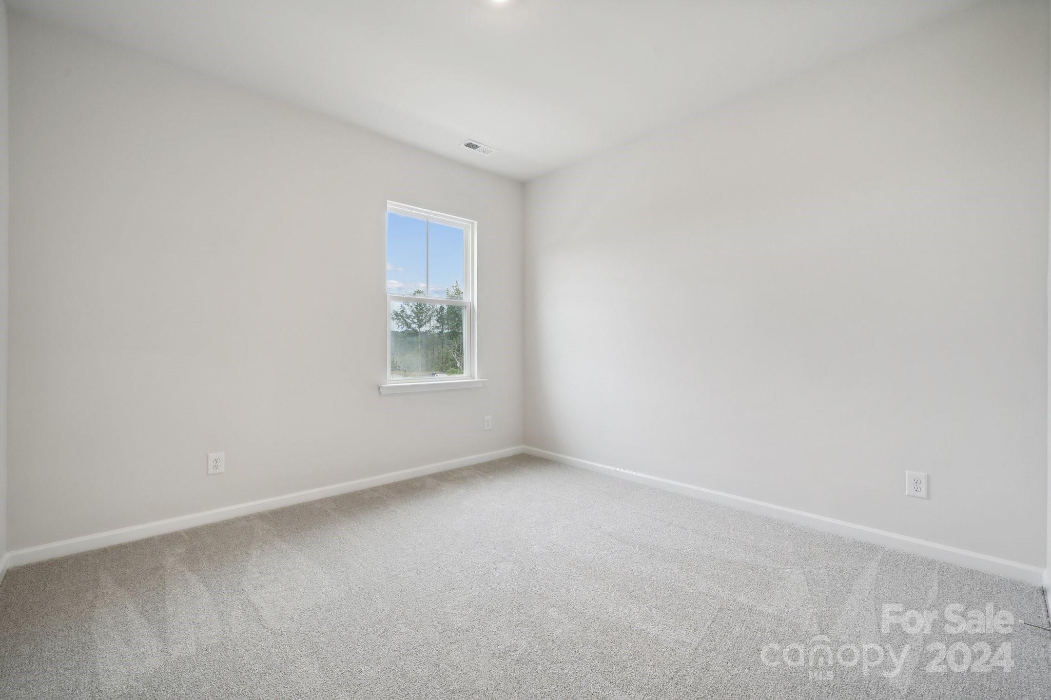 8606 Miles Gap Road Indian Land, SC 29707 - Photo 20 of 26 an empty room with a window