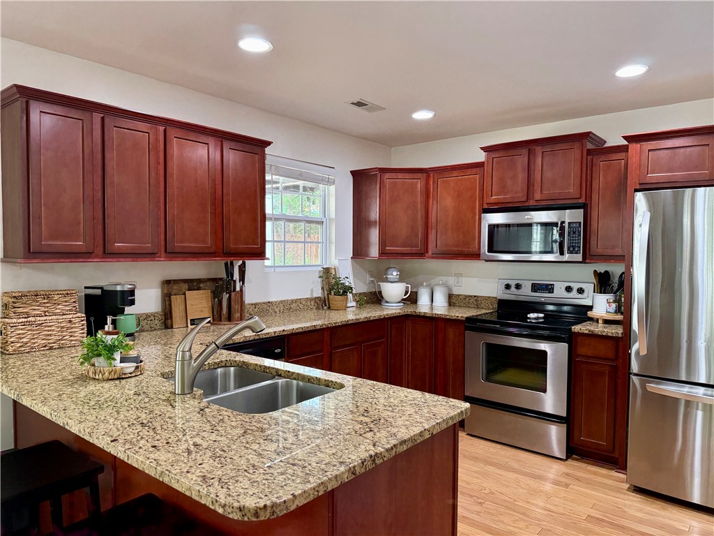 123 Abigail Lane Anderson, SC 29621 - Photo 5 of 22 This thoughtfully designed kitchen offers both beauty and utility for daily living.