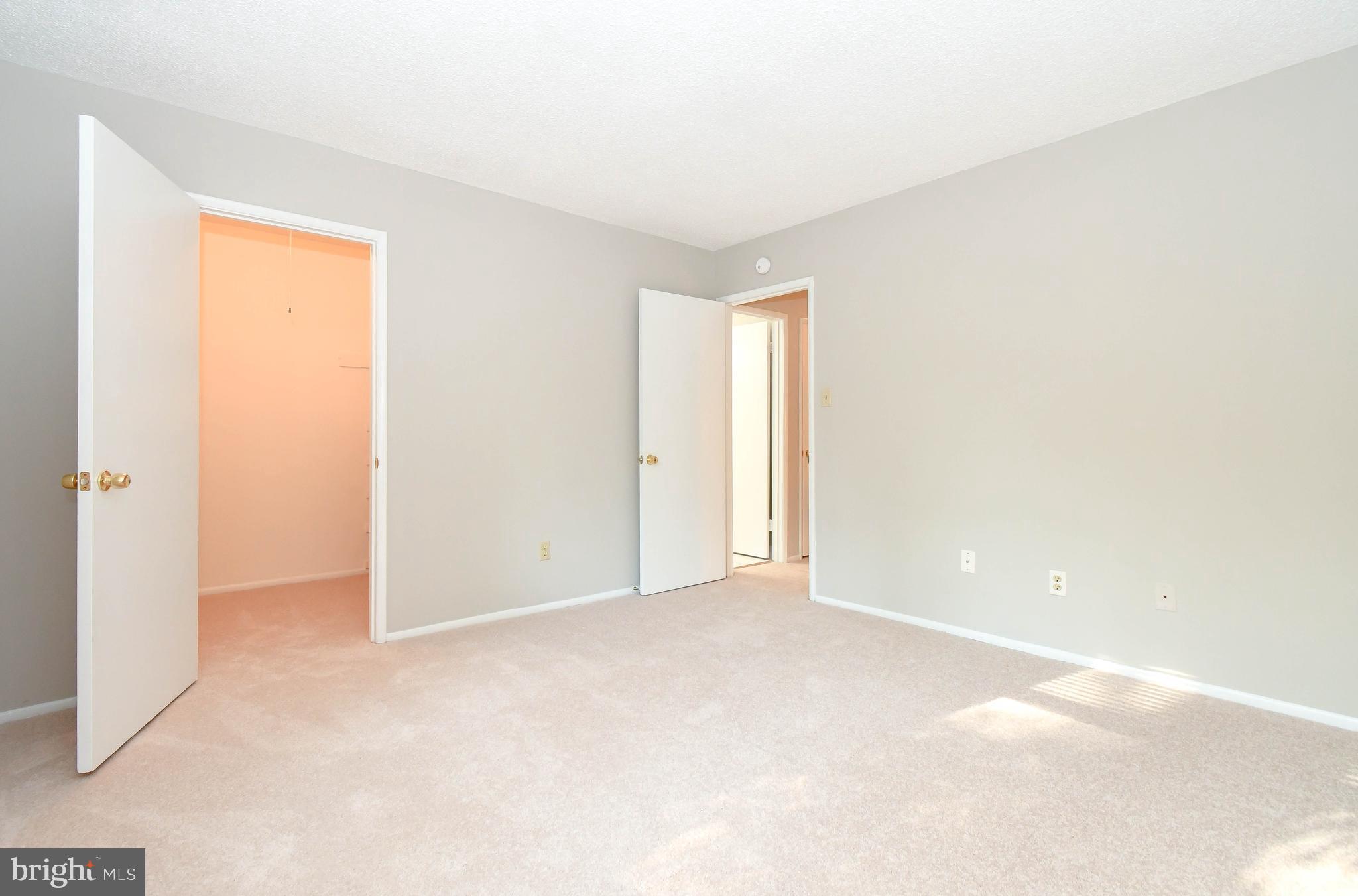 2218 White Cornus Lane Reston, VA 20191 - Photo 28 of 35 Master bedroom w/ walk in closet