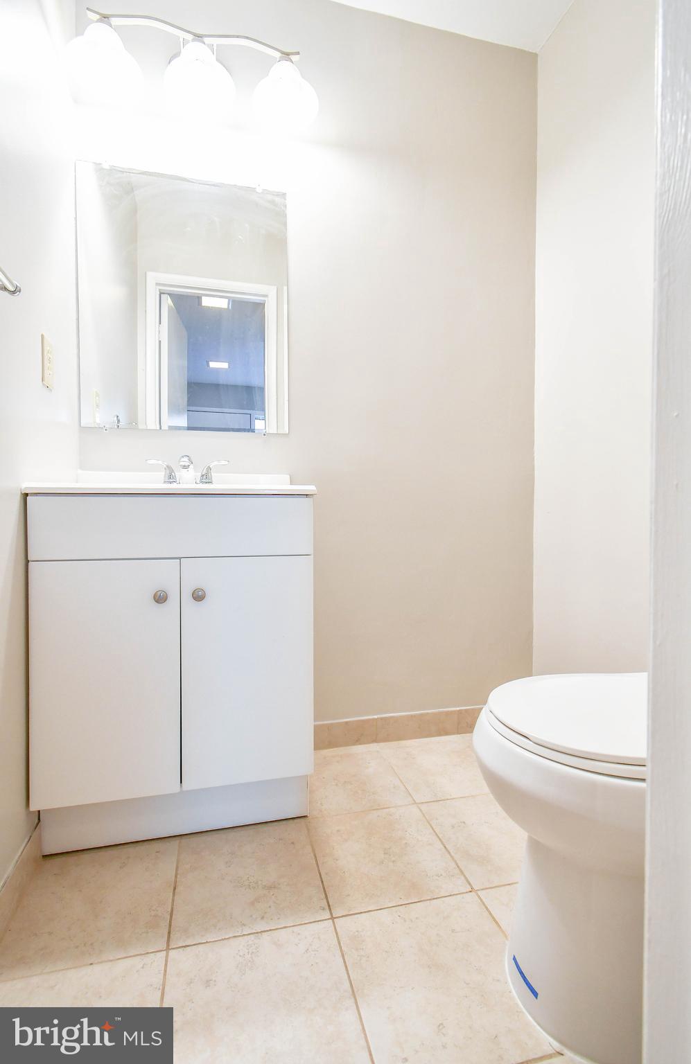 2218 White Cornus Lane Reston, VA 20191 - Photo 35 of 35 Main level powder room