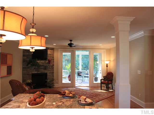 4909 Great Meadows Court Raleigh, NC 27609 - Photo 10 of 25 looking into family room form kitchen