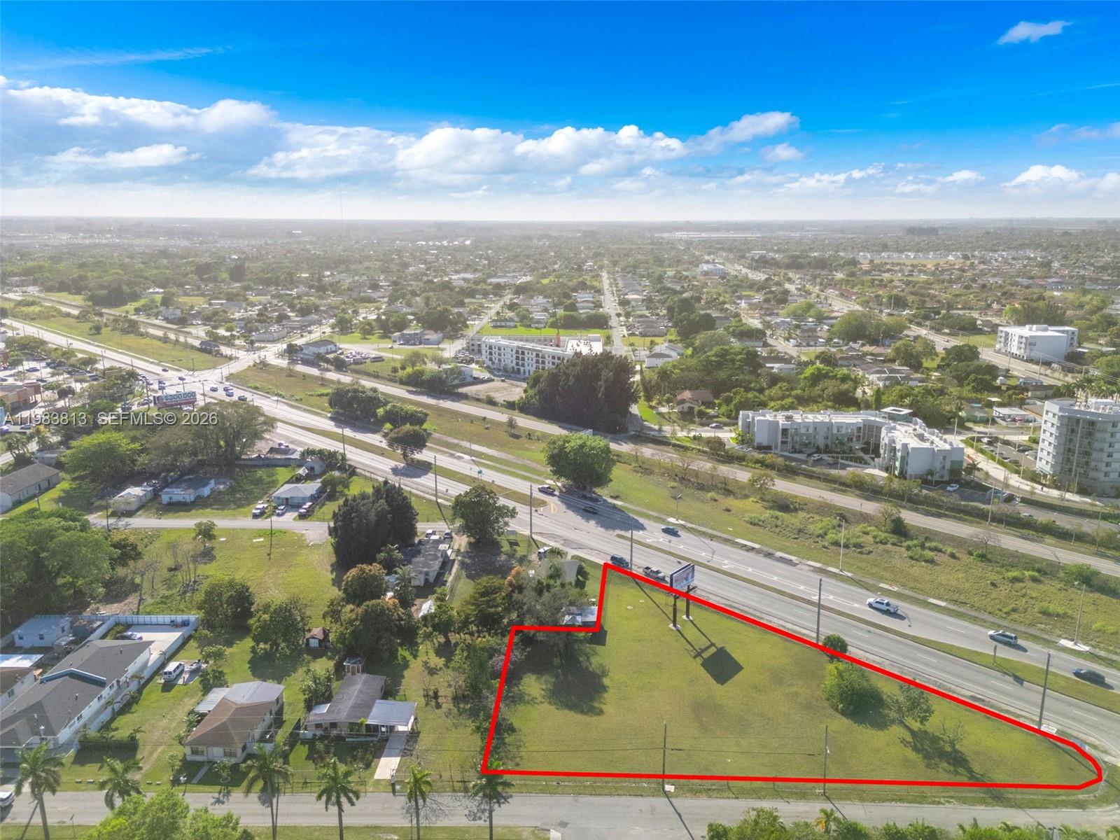 21710 Southwest 118th Avenue Miami, FL 33170 - Photo 15 of 24 an aerial view of residential houses with outdoor space