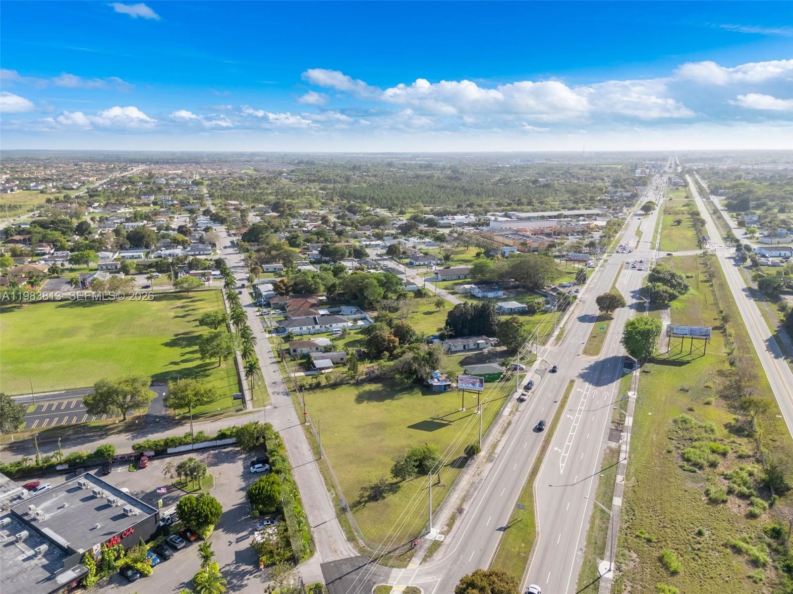 21710 Southwest 118th Avenue Miami, FL 33170 - Photo 23 of 24 an aerial view of residential houses with outdoor space
