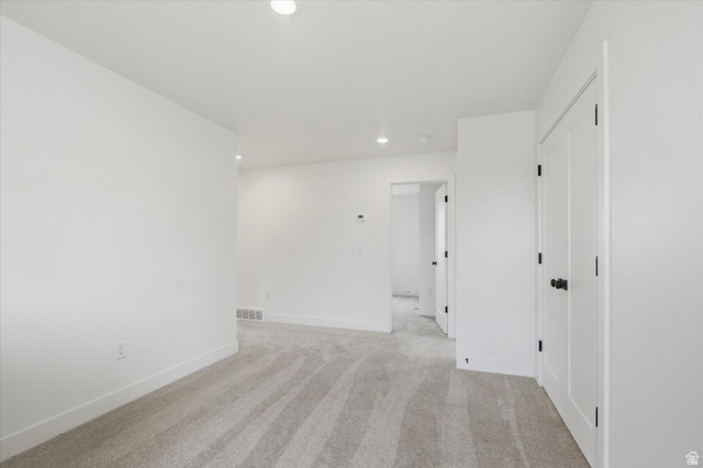 844 North 400 West Logan, UT 84321 - Photo 18 of 43 Light gray carpet flooring extending through the space