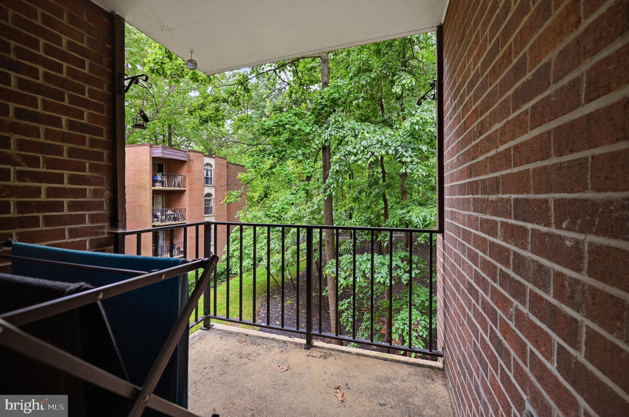 3366 Woodburn Road, Unit 23 Annandale, VA 22003 - Photo 14 of 16 a view of a balcony