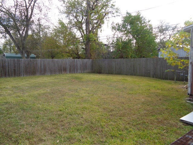 5614 Rue Street Houston, TX 77033 - Photo 18 of 18 a view of a back yard