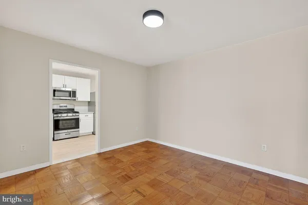 a view of a room with cabinet and air conditioner