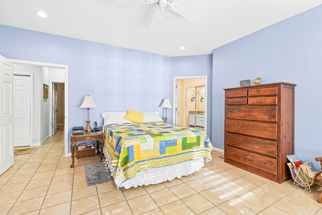 986 Ridgewood Harbor Road Waterloo, SC 29384 - Photo 14 of 43 a bedroom with a bed and a cabinets