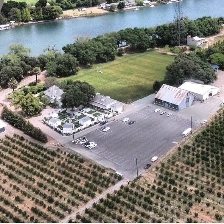 15175 State Highway 160 Isleton, CA 95641 - Photo 5 of 7 an aerial view of a house with a yard and lake view