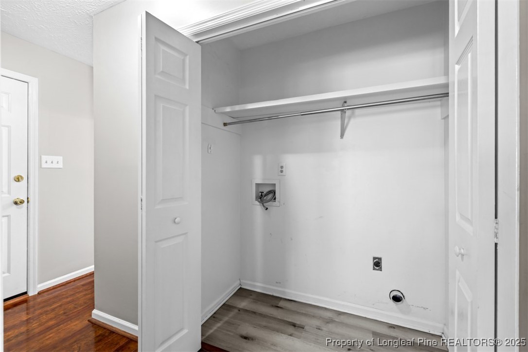 102 Ryans Circle Spring Lake, NC 28390 - Photo 18 of 26 a view of a walk in closet