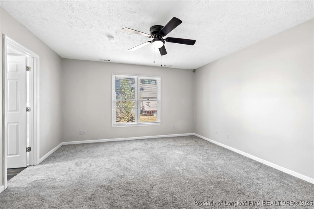 102 Ryans Circle Spring Lake, NC 28390 - Photo 19 of 26 a view of an empty room with a window