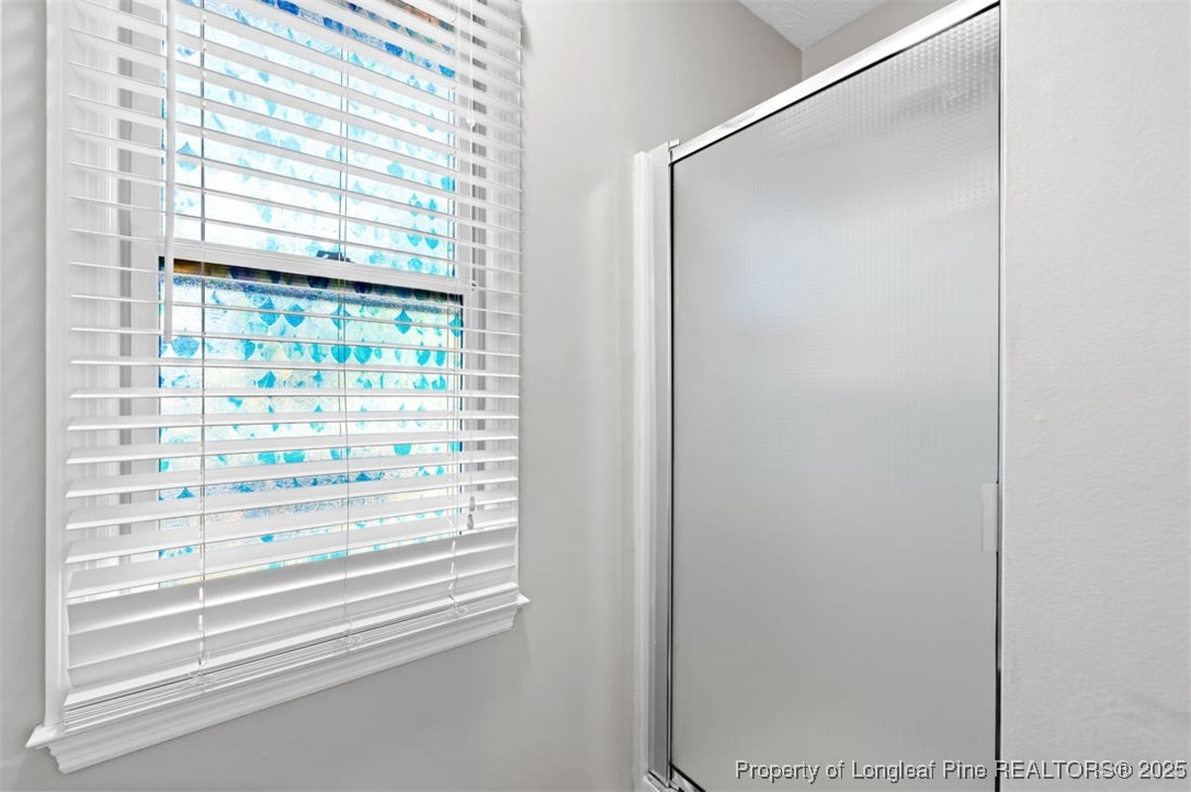 102 Ryans Circle Spring Lake, NC 28390 - Photo 23 of 26 a window with a rack on the wall