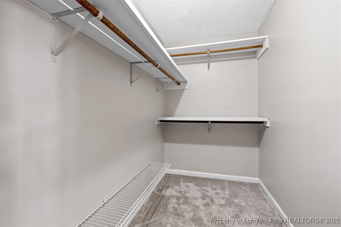 102 Ryans Circle Spring Lake, NC 28390 - Photo 24 of 26 a view of an empty walk in closet