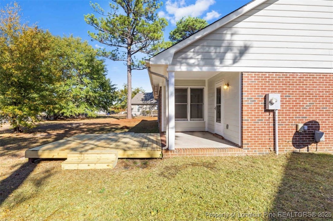 102 Ryans Circle Spring Lake, NC 28390 - Photo 6 of 26 a view of a house with small yard