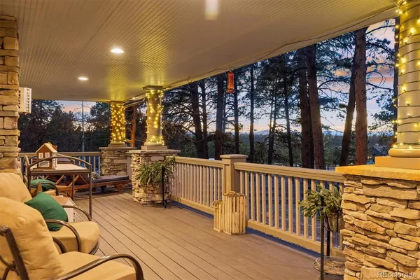 a view of a balcony with chairs
