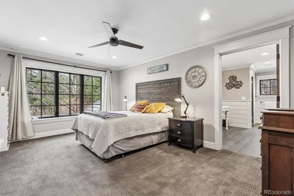 a bed room with a bed and a tv