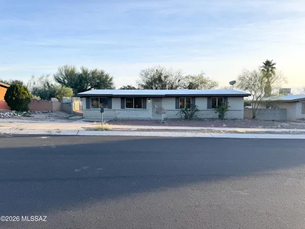 front view of house with a yard