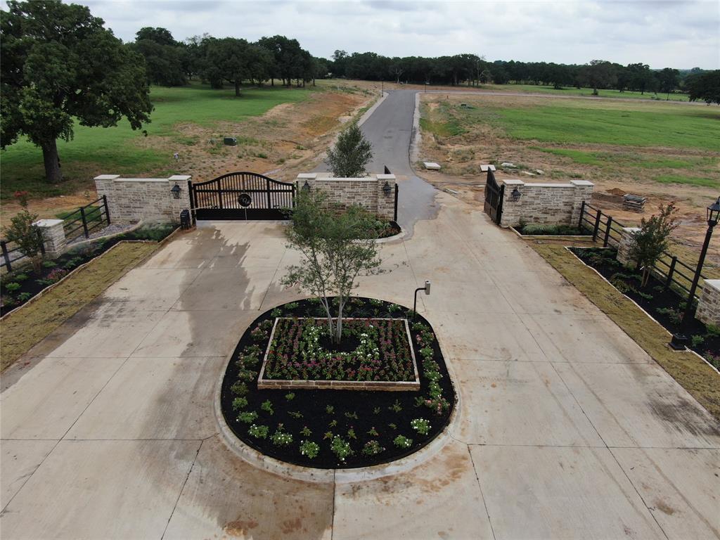 1 Retta Mansfield Road Burleson, TX 76028 - Photo 3 of 8 a view of a lake and outdoor space