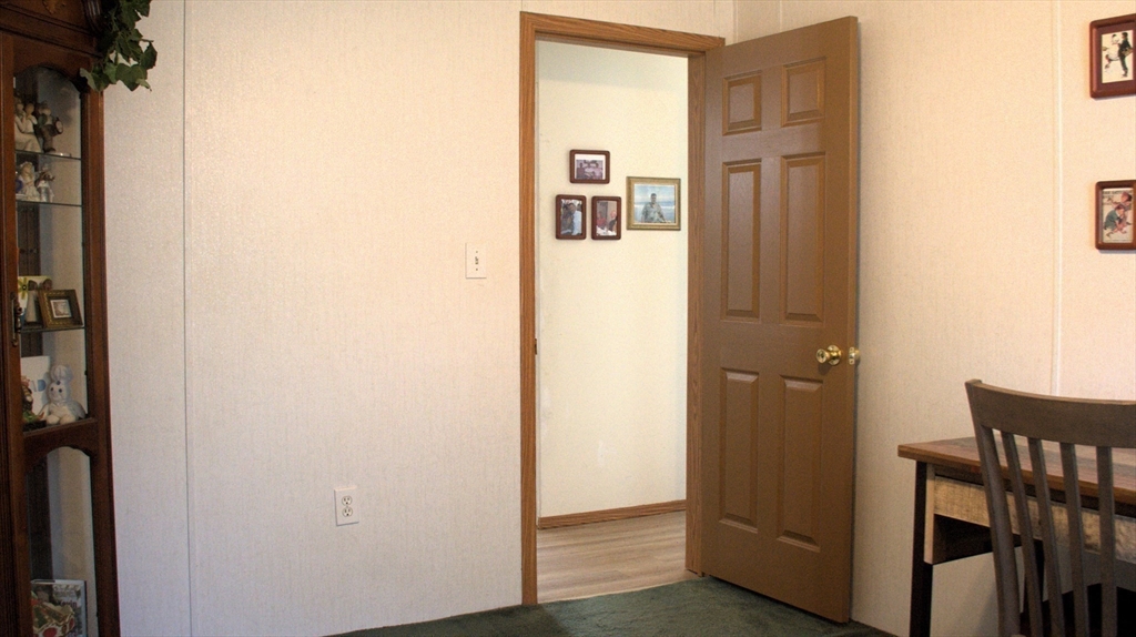 20 Deer Run Brookfield, MA 01506 - Photo 24 of 29 a view of a hallway with wooden floor and entryway