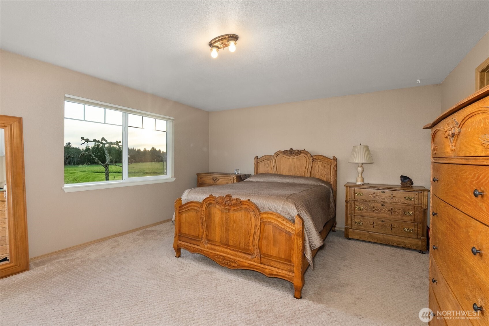 198 Short Road Onalaska, WA 98570 - Photo 16 of 40 a bedroom with a bed and window