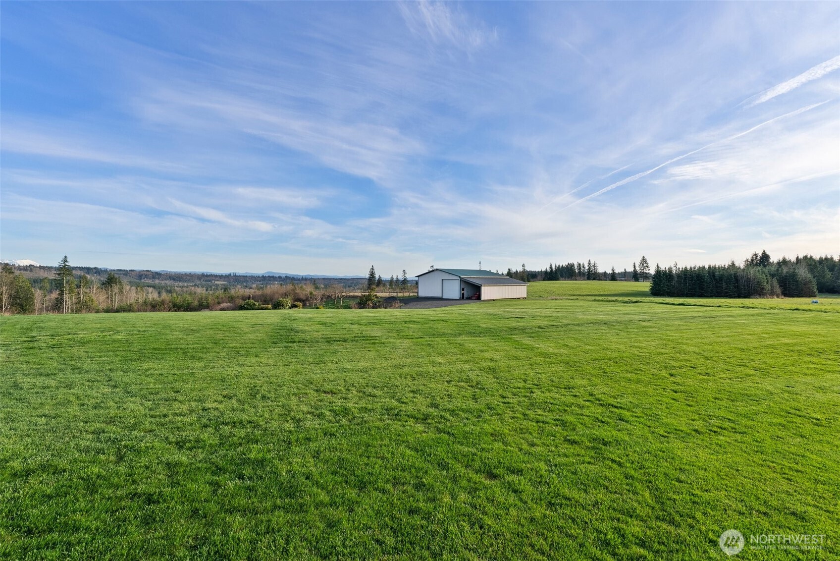 198 Short Road Onalaska, WA 98570 - Photo 32 of 40 a view of a green field with clear sky