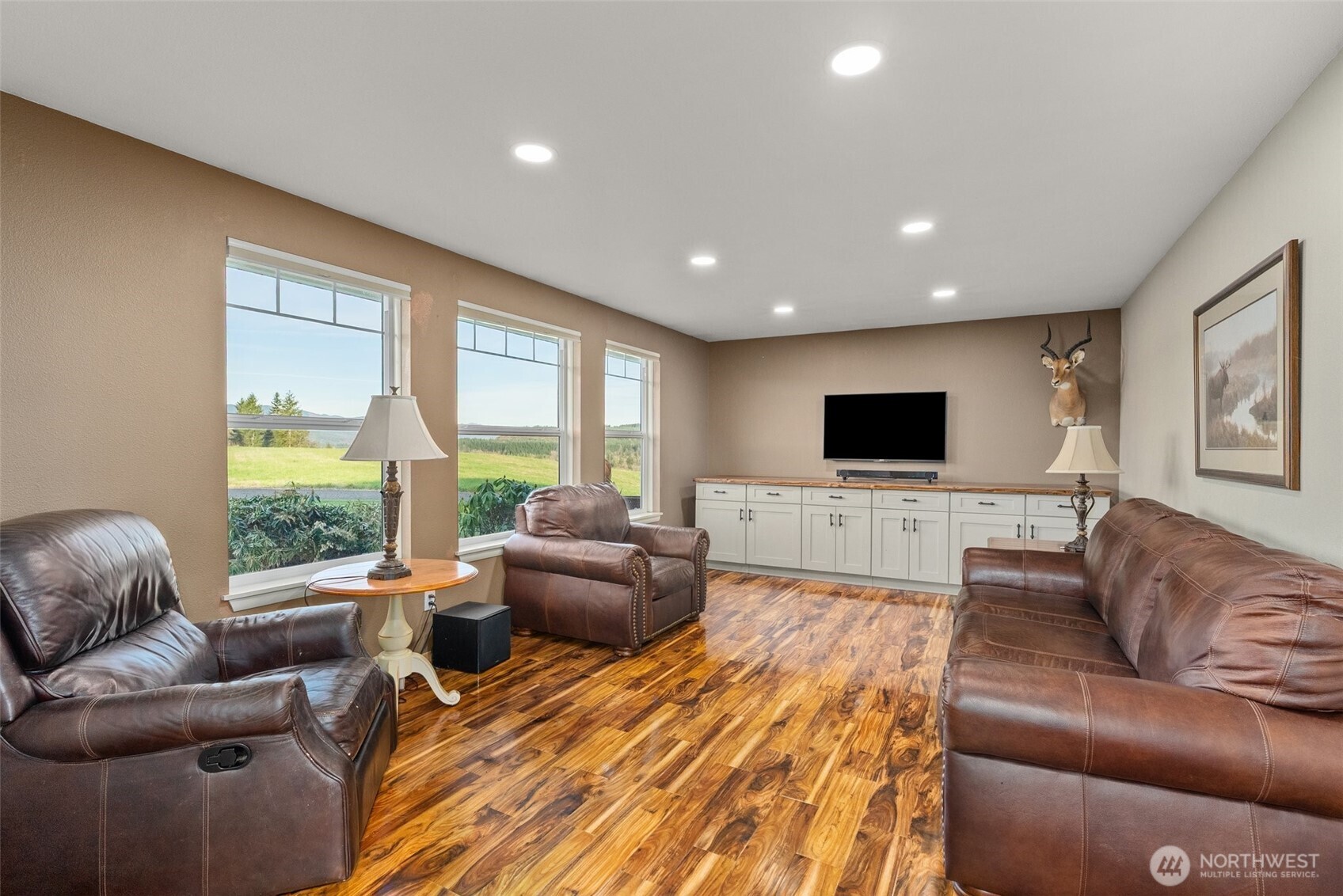 198 Short Road Onalaska, WA 98570 - Photo 9 of 40 a living room with furniture and a flat screen tv