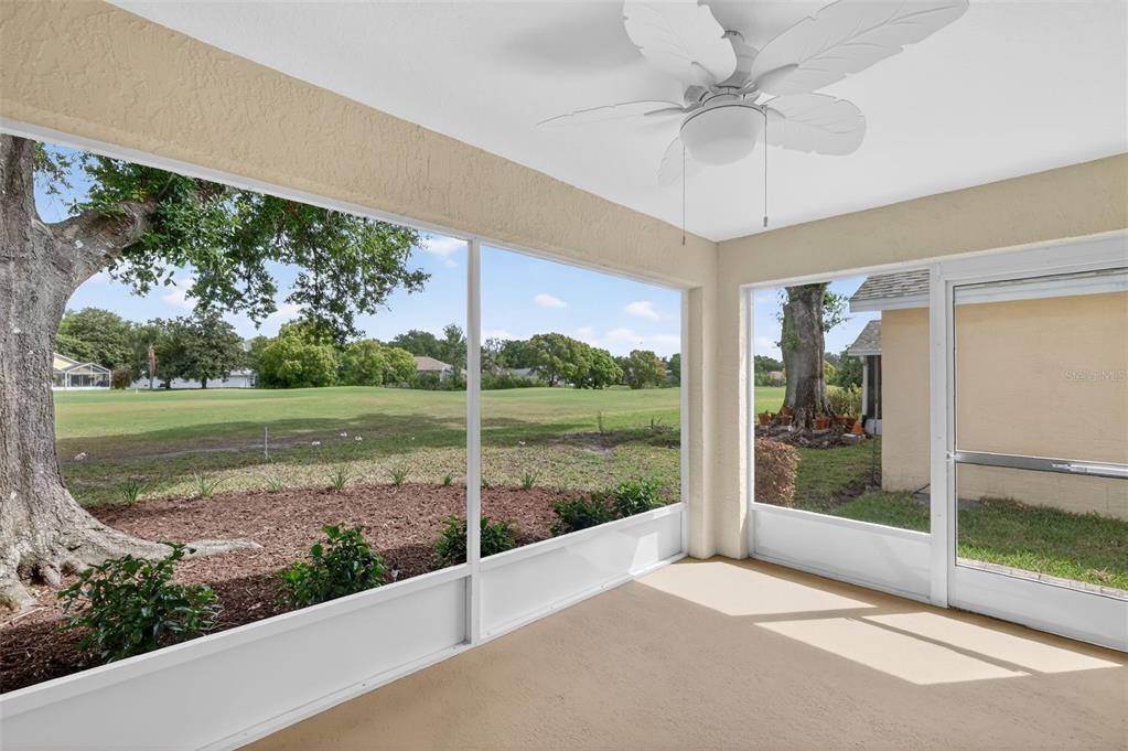 6027 Spring Creek Court Mount Dora, FL 32757 - Photo 25 of 42 a view of a patio with a yard