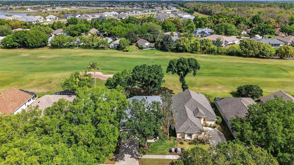 6027 Spring Creek Court Mount Dora, FL 32757 - Photo 29 of 42 a view of a garden with an ocean
