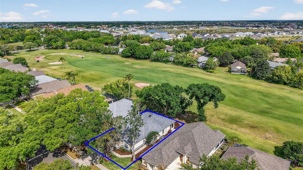 6027 Spring Creek Court Mount Dora, FL 32757 - Photo 31 of 42 an aerial view of a house