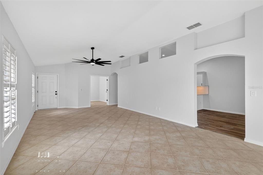 6027 Spring Creek Court Mount Dora, FL 32757 - Photo 5 of 42 a view of empty room with ceiling fan