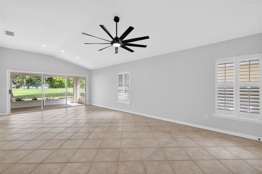 6027 Spring Creek Court Mount Dora, FL 32757 - Photo 6 of 42 a view of an empty room with a window