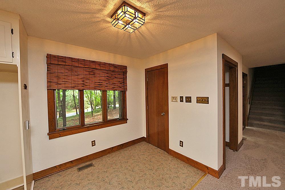 10205 Roadstead Way West Raleigh, NC 27613 - Photo 5 of 22 an empty room with windows