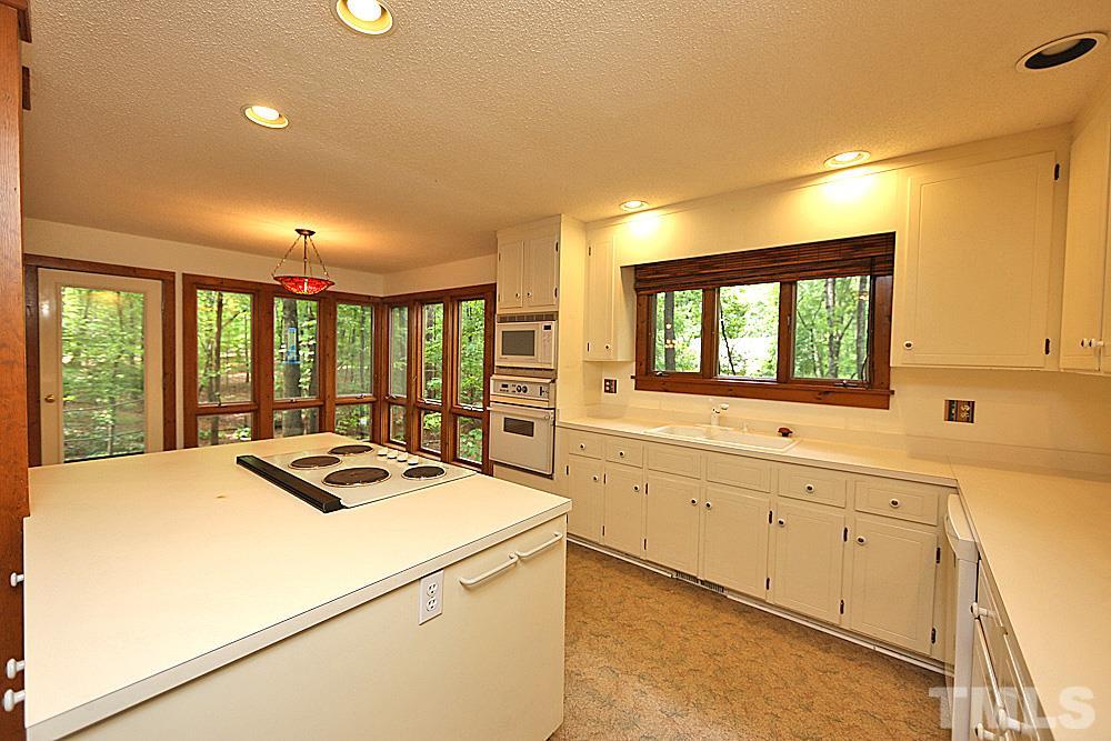 10205 Roadstead Way West Raleigh, NC 27613 - Photo 7 of 22 a room with sink attached with living room