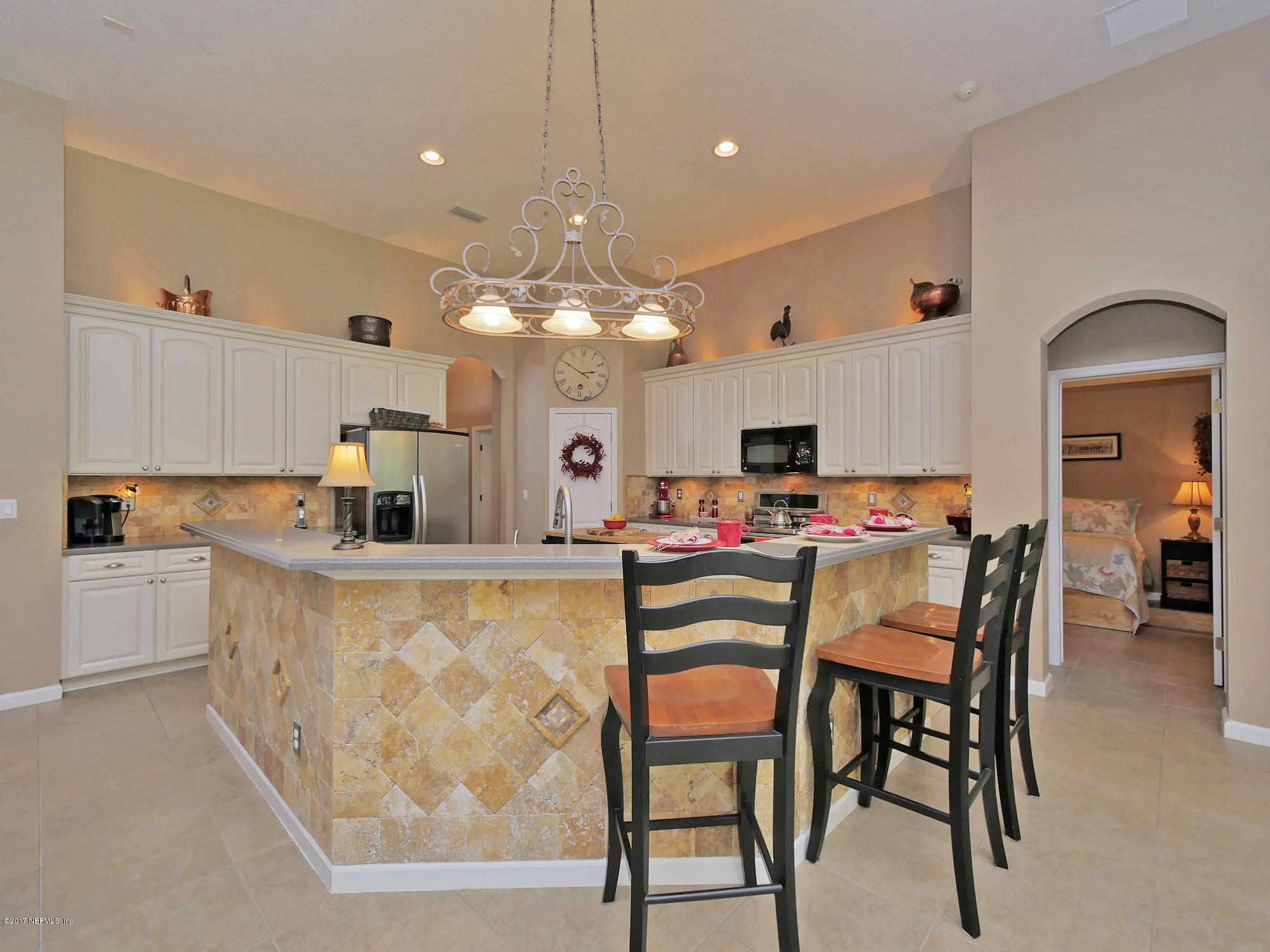 888 Reflection Cove Road East Jacksonville, FL 32218 - Photo 10 of 51 10 tile kick wall at breakfast bar