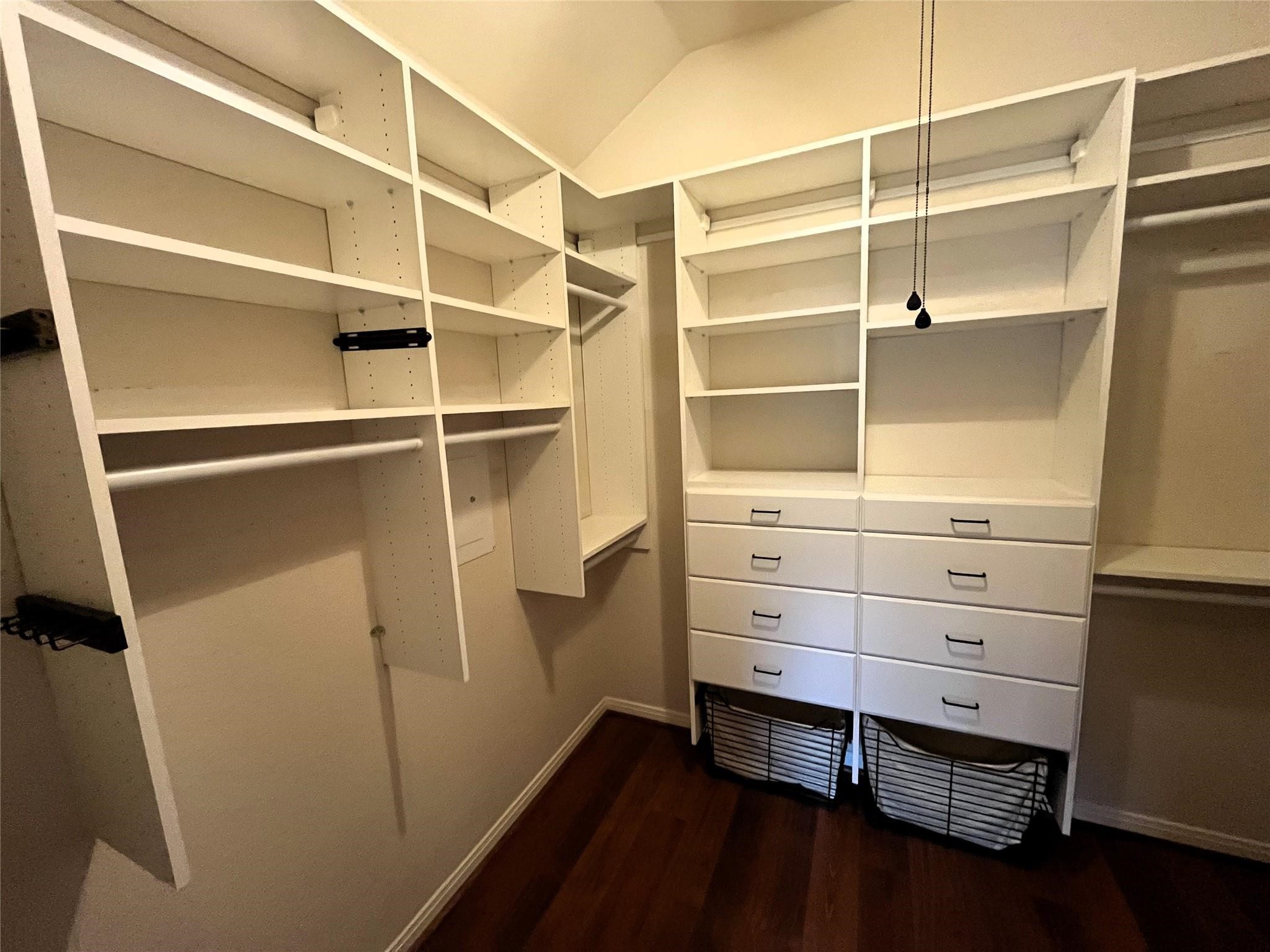 30 South Rambling Ridge Place Conroe, TX 77385 - Photo 11 of 15 a view of walk in closet with empty racks