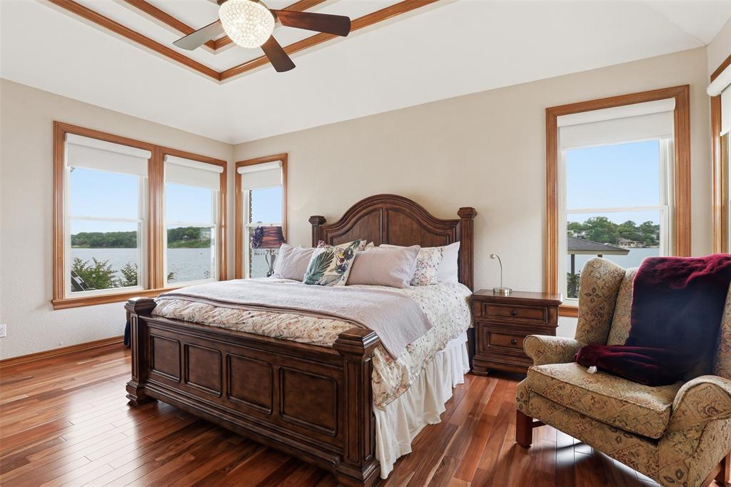 2406 River Road Granbury, TX 76048 - Photo 17 of 40 a bedroom with a bed couch and window