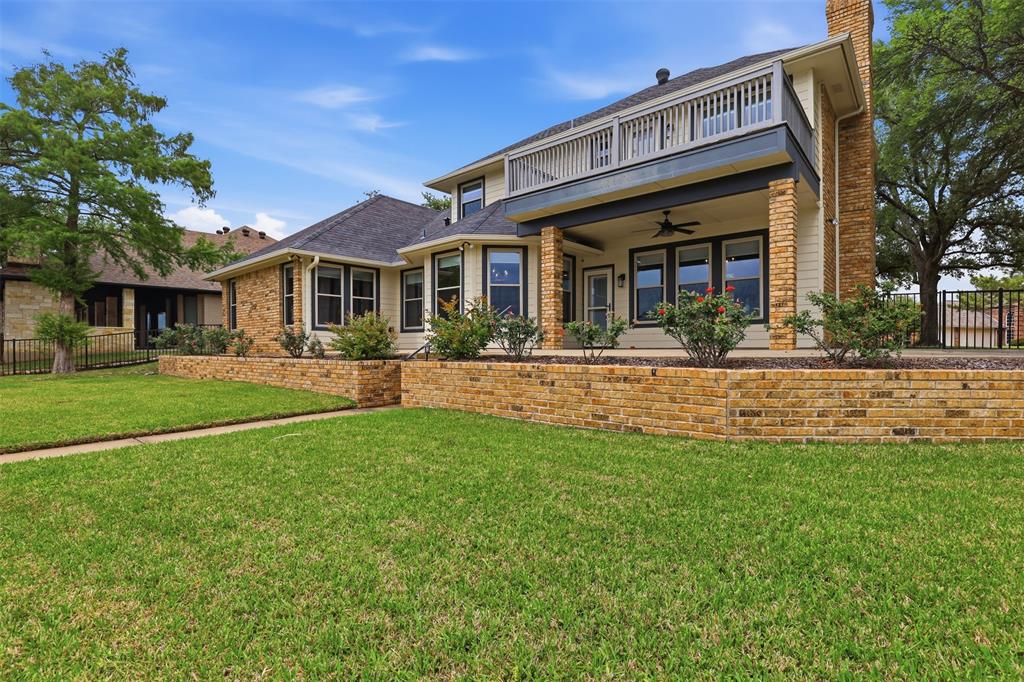 2406 River Road Granbury, TX 76048 - Photo 27 of 40 a front view of house with yard and green space