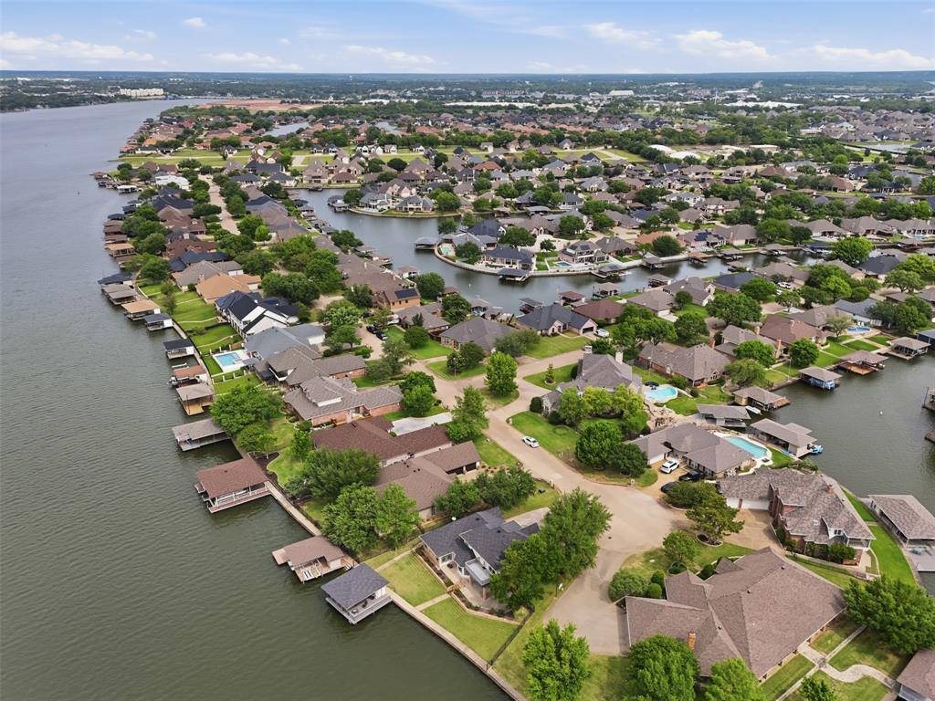 2406 River Road Granbury, TX 76048 - Photo 36 of 40 an aerial view of a residential houses with outdoor space and trees