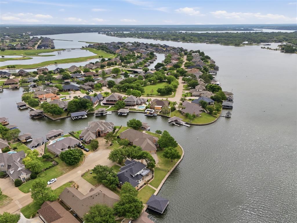 2406 River Road Granbury, TX 76048 - Photo 39 of 40 an aerial view of a houses with a lake view