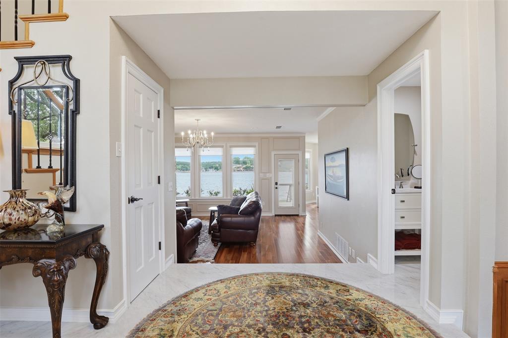2406 River Road Granbury, TX 76048 - Photo 5 of 40 a living room with furniture and a rug