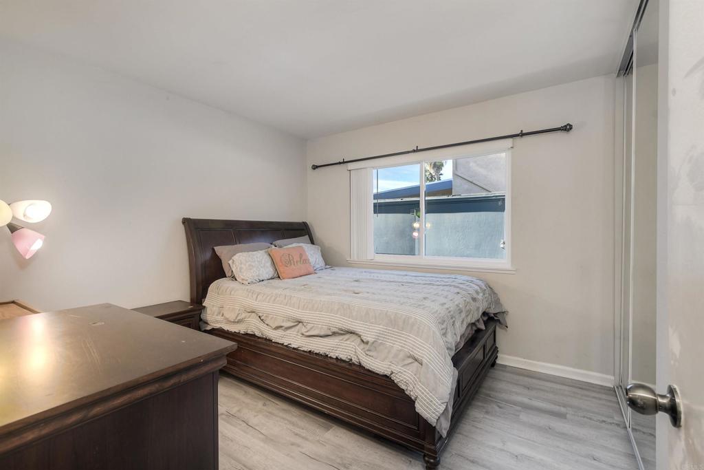 4413 Point Degada Oceanside, CA 92058 - Photo 24 of 46 a bed sitting in a bedroom next to a window