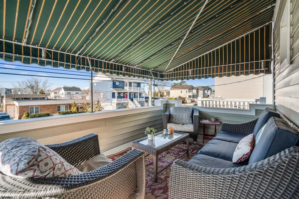 a balcony with furniture