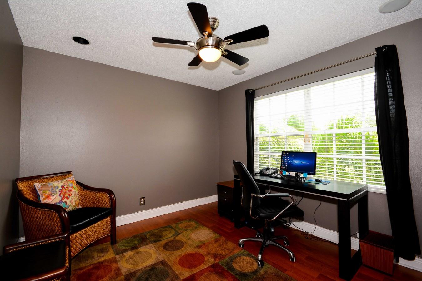 6896 Long Key Street Lake Worth, FL 33467 - Photo 11 of 18 a workspace with furniture and a window