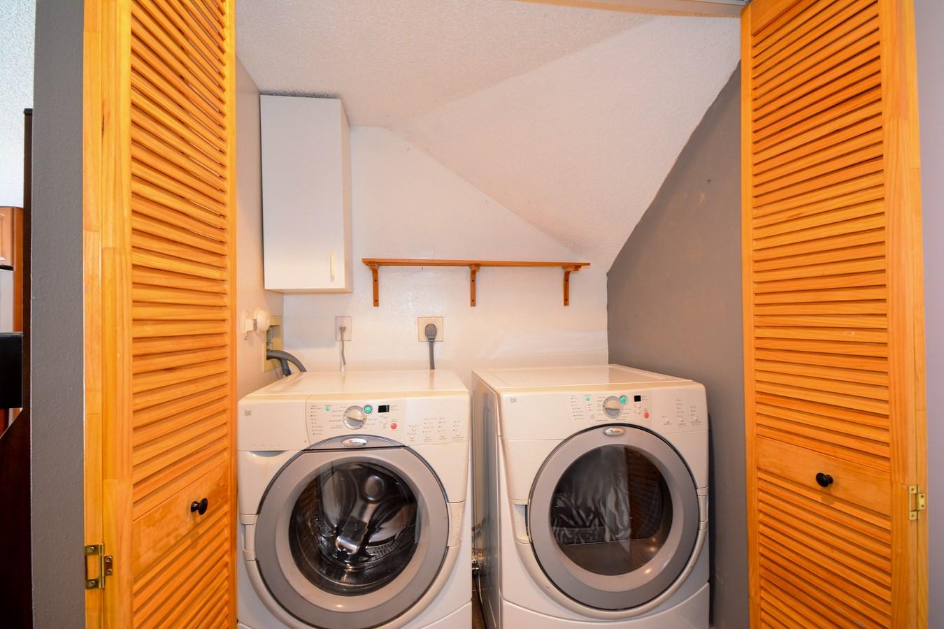 6896 Long Key Street Lake Worth, FL 33467 - Photo 14 of 18 a utility room with dryer and washer