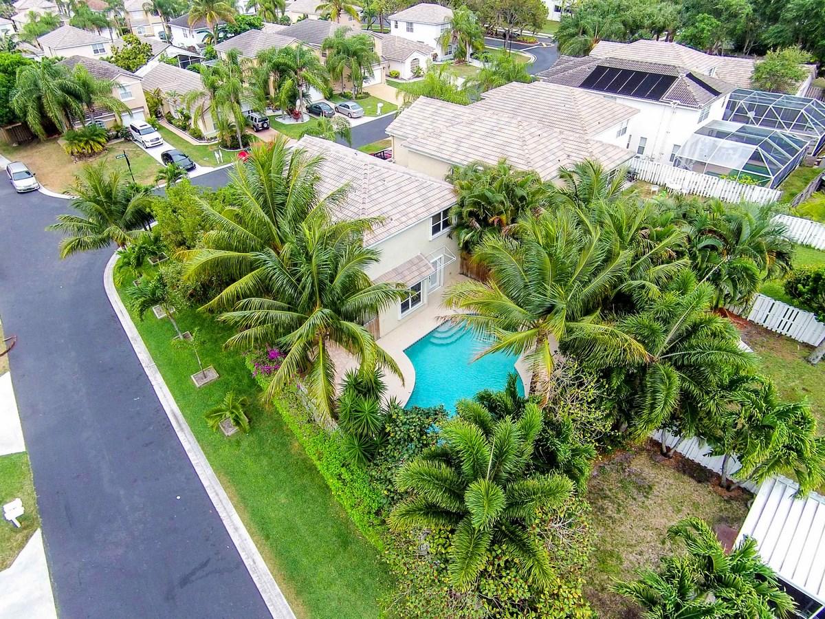 6896 Long Key Street Lake Worth, FL 33467 - Photo 18 of 18 a view of a garden with a flower in a garden